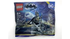 the batman action figure is packaged in plastic