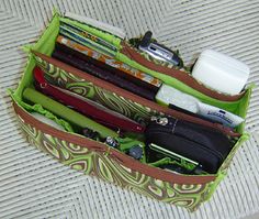 the purse is filled with many different items