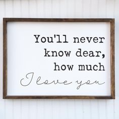 a framed sign that says you'll never know dear how much i love you