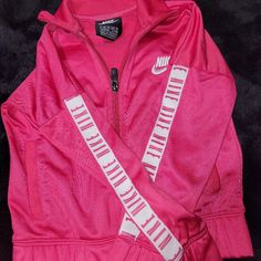 Pink Nike Jacket Kids Size 4(Xs) Well Taken Care Of.Looks Brand New. No Flaws Casual Pink Nike Windbreaker, Sporty Pink Nike Outerwear, Nike Pink Sports Outerwear, Nike Pink Hoodie With Drawstring Hood, Nike Jacket Kids, Pink Nikes, Kids Nike, Kids Jacket, Nike Jacket