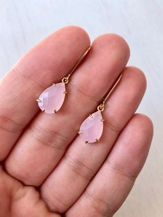 Rose Quartz Earrings, Pink Teardrop Earrings, Blush Pink Earrings, Small Dangle Earrings, Rose Quartz Gold Jewelry, Gift for Mom, Girlfriend These small but gorgeous earrings feature soft pastel pink rose quartz faceted teardrops bezel framed in gold filled. The teardrops are suspended from gold filled lever back ear wires. These are understated, delicate and dainty earrings but with a gorgeous soft and neutral color sure to match many outfits. Ideal for a girl or a women that likes light weight Rose Gold Hypoallergenic Teardrop Earrings For Gift, Feminine Teardrop Earrings For Party, Hypoallergenic Pink Earrings As A Gift For Her, Feminine Crystal Drop Earrings For Gifts, Feminine Crystal Drop Earrings As Gift, Pink Drop Earrings As Gift For Her, Pink Gold Drop Earrings, Pink Drop Earrings For Her, Rose Gold Teardrop Dangle Earrings As Gift