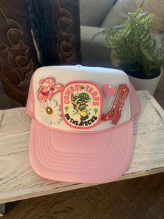 Cute Trucker Hat! Perfect for gift, Rodeo , or a day at the Lake! :) Details:  *Pink/ White *Polyester with Iron-on patches *One Size Hat with adjustable snap back; adjustable 20 inches to 23.5 inches Cheap Logo Patch Trucker Hat, Pink Hat With Flat Brim, Flat Brim Pink Hat One Size, Pink Flat Brim Hat, One Size Fits Most, Retro Pink Trucker Hat, Cute Flat Brim Hat One Size, Adjustable Pink Trucker Hat With Patches, Pink Retro Snapback Trucker Hat, Retro Pink Snapback Trucker Hat