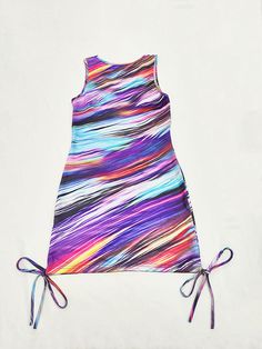 Material: Made of 90-95% Polyester & spandex.Feature: Sleeveless. abstract print. tie dye. v-neck. tie up. ruched. bodycon. mini dress.Style: Casual. Clubwear Trendy Fitted Tie Dye Dresses, Purple Ruched Bodycon Summer Dress, Summer Mini Dress With Abstract Print, Fitted Multicolor Mini Dress With Tie Back, Sleeveless Mini Dress With Abstract Print For Party, Vacation Mini Dress With Abstract Print, Multicolor Printed Mini Bodycon Dress, Sleeveless Bodycon Mini Dress With Drawstring, Multicolor Printed Bodycon Mini Dress