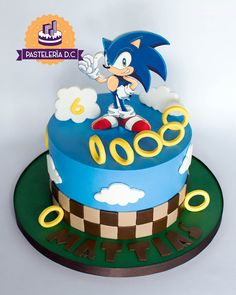 a sonic the hedgehog birthday cake on a green plate