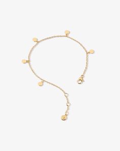 Made in 18K gold over brass Adjustable chain length: 6-7 inches; 16 + 1 + 1 cm Disc charm height: 4 mm SKU: B1310GLD6_7 Gold Dainty Paperclip Bracelet With Lobster Clasp, Elegant Gold-tone Bracelet With Dangling Charms, Dainty Gold-plated Chain Bracelet With Lobster Clasp, Gold-tone Gold Plated Charm Bracelet With Adjustable Chain, Elegant 14k Gold-filled Paperclip Bracelet With Adjustable Chain, Stethoscope Charms, Pill Bottles, Pure Gold, Favorite Rings