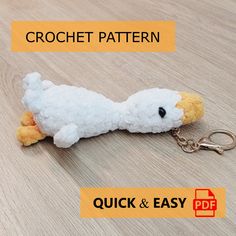 a stuffed animal keychain with the words crochet pattern written below it