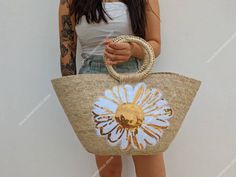 I love  Mexico celebrates the native crafts of Mexico and the artists that produce them, enabling them and their communities to get recognized for their talented work and achieve economic stability for their families. This listing is for this bag shown on the picture, made of palm leaves and 100% natural materials. The display picture showcases the bag in natural color, please see other available colors available. The bag comes with a sequin patch on the front side. The tassels or other accessor Tote Bag Summer, Native Crafts, Mexican Christmas, Painted Hats, Farmers Market Bag, Sequin Patch, Handmade Market, Nativity Crafts, Christmas Tree Garland