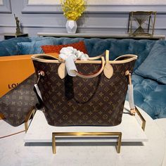 Description L.V Neverfull MM Tote Bag Monogram Canvas For Women, Women’s Handbags, Shoulder Bags 12.6in/32cm LV M40995 Rep 1:1 Size: 12.6 x 11.4 x 6.7 inches / 32 x 29 x 17 cm (Length x Width x Height) The Neverfull MM tote unites timeless design with heritage details. Made from supple Monogram canvas with natural trim, it is roomy yet not bulky, with side laces that cinch for a sleek allure or loosen for a casual look. Slim, comfortable handles slip easily over the shoulder or arm. Lined in col Lv Neverfull Mm, Lv Neverfull, Colorful Textiles, Neverfull Mm Monogram, Louis Vuitton Neverfull Mm, Neverfull Mm, Canvas Handbags, Vuitton Neverfull, Evening Clutch Bag