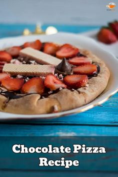 a chocolate pizza with strawberries on it and the words chocolate pizza recipe written below