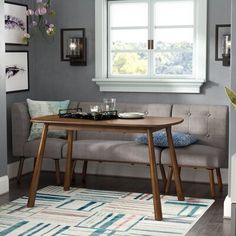 a living room scene with focus on the couch and coffee table in the center area