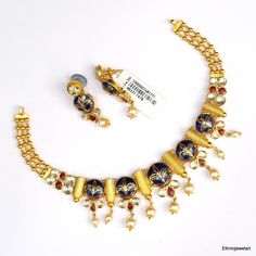 Vintage 22K Yellow Gold Choker Necklace with Earrings. Made of 22K Solid Gold and Set with Gemstones. Weight-53.670 Grams, Length-22 cm, Width-3 cm. Earrings-3.7 cm 22k Gold Bridal Necklace With Meenakari, Traditional 22k Gold Jewelry For Anniversary, Celebration 22k Gold Temple Necklace With Meenakari, Kundan Necklace With Tilla For Anniversary And Festivals, Hallmarked Kundan Necklace For Anniversary And Festivals, Hallmarked Kundan Necklace For Festivals And Anniversary, Traditional Gold Plated Bridal Necklace For Anniversary, 22k Gold Kundan Necklace For Diwali And Formal Occasions, Traditional Kundan Necklace With Tilla For Anniversary