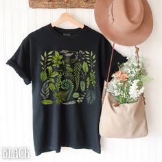 Forest Fern Shirt, Botanical tshirt, Herb Floral Tee, Forestcore Aesthetic, Goblincore, Forest Graphic Tee, Nature Shirt, Nature Lover Shirt Gift for Plant Lover, Gardening Shirt, Comfort Colors, Wildflowers Shirt, Botanical tshirt, Herb Floral Tee, Flower Shirt, Floral Tee, Gift for Her, Shirt Gift for Plant Lover, Gardening Shirt, Plant Lover Graphic Tee, Plant lady t  Plant Lady, Plant Gift for Her, Gardening Shirt, Plant Lover Graphic Tee, Plant T shirt, Boho Tee, Retro Gardening Shirt, Plan Black Crew Neck T-shirt With Plant Print, Black Short Sleeve Shirt With Plant Print, Green Graphic Tee With Plant Print, Green Graphic Tee With Plants Print, Black Graphic Tee With Plant Print, Black Graphic Tee With Plants Print, Casual Black T-shirt With Plant Print, Green Botanical T-shirt With Graphic Print, Botanical Green T-shirt With Graphic Print