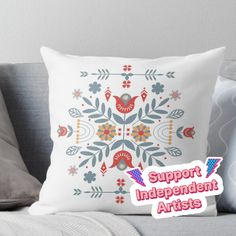 a pillow with an image of a bird on it and the words support independent artists