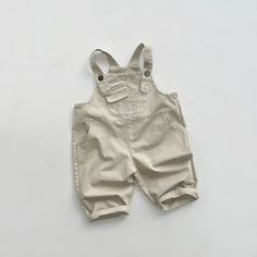 Introducing our Front Pocket Solid Overalls, the perfect choice for your little ones! 🌟 Made with high-quality cotton, these overalls are not only comfortable but also durable. The loose fit allows for easy movement, making them ideal for active kids aged 1-6. With a button-fly closure and solid pattern, these overalls are both stylish and practical. Whether it's playtime or a special occasion, these unisex overalls are sure to keep your child looking adorable. Shop now and give your little one Unisex Overalls, Baby Turban, Active Kids, 3rd Baby, 2nd Baby, 3 Kids, Turbans, Grey Khakis, Baby Skin