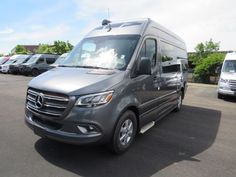 a mercedes van parked in a parking lot