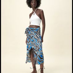 Printed Wrap Skirt Chic Long Wrap Skirt For Beach, Chic Long Wrap Skirt For The Beach, Versatile Maxi Skirt For Vacation, Chic Long Skirt For Beach Season, Chic Beach Wrap Skirt With Lining, Zara Flowy Maxi Skirt For Vacation, Chic Relaxed Wrap Skirt For Vacation, Chic Lined Beach Skirt, Chic Lined Wrap Skirt For Beach