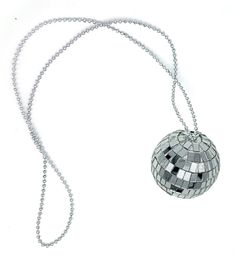 a silver disco ball is hanging from a chain