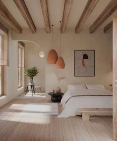 a bedroom with wooden beams and white bedding in the center, along with two large windows