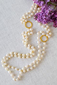 Two strands of faux pearls connected with silver or gold rings to create a timeless, classic look to suit any style. Length 24" 1 1/2" Extender Long Pearl Necklace, Elegant Rings, Pearl Strands Necklace, Pearl Necklace Designs, Chanel Necklace, Long Pearl Necklaces, Pearl Strand, Pearl Design, Pearl Strands