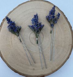 A lovely set of 3 delicate dried flower hair pins.  Perfect for those hair up dos for your bridesmaids or for the bride herself. Adorned with sprigs of lavender and purple limonium, secured with silver wire.  If you need your order in a hurry, then please contact me prior to ordering and I will try my best to make it sooner for you.  Each hair pin set is handmade to order so I am more than happy to change something to make it perfect for you.  Please take care as dried flowers can be delicate. Handle with care. Light shedding may occur.  Matching hair comb available. Thank you for visiting Zoe's Blooms🌷 Lavender Hair Accessories, Wisteria Hairpin, Purple Hairpiece, Lavender Hair Clip, Purple Flower Hair Clip, Dried Lavender Flowers, Lavender Hair, Flower Hair Pin, Dried Lavender