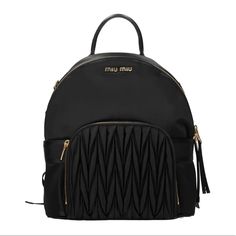 Excellent Condition! Barely Warn, Looks Fresh And New. This Miu Miu Backpack Is Sleek And Chic. With The Signature Pleated Pocket And Simple Gold Hardware, This Bag Is Sure To Be A Closet Staple. Miu Miu Shoulder Bag With Adjustable Strap For Travel, Modern Miu Miu Bags For Travel, Modern Miu Miu Travel Bag, Chic Black Miu Miu Shoulder Bag, Miu Miu Bag With Adjustable Strap For Everyday Use, Miu Miu Bags With Adjustable Strap For Everyday Use, Miu Miu Evening Bag With Zipper Closure, Luxury Miu Miu Bags With Zipper Closure, Miu Miu Satchel With Adjustable Strap