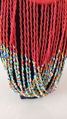 African Fringe Necklace, African Beaded Jewelry, Red Beaded Necklace, Tribal Jewelry, Women Necklaces, Mothers Gift, Chunky JewelryThis multi strand necklace is superbly crafted which makes you out stand in any occasion.Main Color - Red.Different colors are available.Feel free to send me a convo or e-mail for any clarification or more information.Thank you for visiting, Red Multi-strand Beaded Bracelets, Red Long Beaded Necklaces For Party, Long Red Beaded Necklaces For Parties, Red Long Beaded Necklace For Party, Red Long Beaded Necklace With Faceted Beads, Red Faceted Beads Long Necklace, Red Long Necklace With Faceted Beads, Red Long Faceted Beaded Necklace, Handmade Red Multi-strand Beaded Bracelets