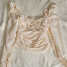 Great Condition Never Worn Just Took Tags Off Slightly Slim Fit, More Like An Xs Elegant Cropped Cream Top, Elegant Cream Cropped Tops, Feminine Cropped Ruched Tops, Feminine Ruched Cropped Tops, Elegant Cream Crop Top For Spring, Elegant Beige Off-shoulder Top, Elegant Off-shoulder Beige Tops, Fitted Beige Ruched Top, Elegant Beige Cropped Blouse