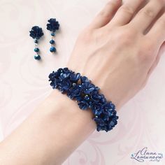 "Navy blue bracelet Dark blue bracelet Navy blue jewelry set Blue flower bracelet Blue bridesmaid bracelet Dark blue jewelry gift Blue wedding Dark blue bracelet with flowers and crystal beads. This bracelet will be a great addition to your look. This bracelet looks great with a bridesmaid dress. It also looks good with a wedding dress if the wedding color is blue. This bracelet will be your favorite. Length of the bracelet approx 18.0см / 7.08\" + extension chain 5см / 1,97\" Please, let me know the scope of your wrist, so I could make the desired bracelet length. A necklace is suitable for these bracelet : https://etsy.me/3nCAimS our https://etsy.me/3fAJMdX A earrings is suitable for these bracelet : https://etsy.me/3rtOiQX A ring is suitable for these bracelet : https://etsy.me/3FzwWHj Blue Flower-shaped Formal Jewelry, Blue Flower-shaped Wedding Jewelry, Adjustable Handmade Flower Jewelry For Wedding, Adjustable Blue Beaded Bracelets For Wedding, Blue Elegant Beaded Bracelets For Formal Occasions, Elegant Blue Beaded Bracelets For Formal Occasion, Elegant Blue Flower Bracelets, Elegant Blue Flower Jewelry, Adjustable Blue Crystal Bracelet For Wedding