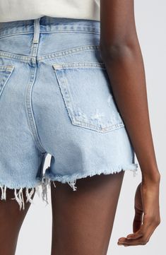 A relaxed fit and destroyed light-wash denim create plenty of vintage attitude on high-rise shorts finished with ragged raw-edge hems. 3" inseam; 24" leg opening; 11 1/2" front rise; 15" back rise (size 29) Button fly closure Five-pocket style 100% cotton Machine wash, tumble dry Imported t.b.d. Ripped Faded Jean Shorts, Faded Ripped Jean Shorts, Summer Ripped Faded Jean Shorts, Summer Faded Ripped Jean Shorts, Light Wash Distressed Cutoff Shorts, Distressed Light Wash Cutoff Shorts, Ripped Faded Shorts, Faded Ripped Shorts, High Rise Distressed Faded Jean Shorts