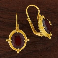 Aurelian Garnet Earrings Gold Ruby Earrings For Evening, Luxury Gold Garnet Jewelry, Elegant 22k Gold Red Jewelry, Oval Temple Jewelry For Formal Occasions, Elegant Red 22k Gold Jewelry, Elegant Yellow Gold Garnet Earrings, Polished Garnet Gold Jewelry, Classic Gold Ruby Earrings, Gold Faceted Ruby Jewelry