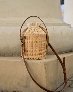 Round wicker basket with adjustable leather long and short straps, have inside cotton bag. It is carefully hand-made by local artisans. This fashionable, stylish and environmentally-friendly basket is perfect for everyday use or going out. Basket have fantastic proportions and handle that perfectly fit into your hand. Wicker basket can be ideal gift for your mum, sister or friend! Features: - a precisely handmade basket made in Lithuania - made from all-natural, eco-friendly and sustainable mate Round Wicker Basket, Jane Birkin Basket, Rattan Handbags, Purse Tutorial, Bucket Handbags, Straw Basket, Wicker Bags, Rattan Bag, Top Handle Bags