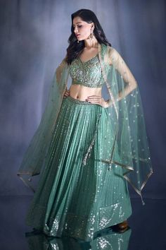 Pista green attached cancan lehenga with sequin, thread embroidery and side tassels. Paired with a padded embroidered blouse and net embroidered dupatta. - Aza Fashions Cancan Lehenga, Lehenga Pattern, Jayanti Reddy, Pista Green, Anushree Reddy, Green Lehenga, Rohit Bal, Embroidered Lehenga, Tarun Tahiliani