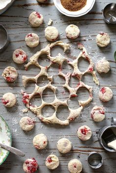 the dough is being made and ready to go into the cookie tins on the table