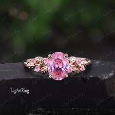 Oval cut Pink Sapphire Engagement ring Rose Gold Promise Ring Leaf Nature Inspired Bridal Ring Sept Gemstone Ring anniversary gifts Jewelry Ring Details: - Theme:Romantic Wedding & Engagement - comfortable band - Stone:6*8mm lab created pink sapphire Side stones: lab created pink sapphire - Total weight: 0.09 ctw (High Quality) - ring band width :1.5mm - ring thicknesses:1.2mm Wedding Band:0.065ctw Stones: 0.065ctw lab created pink sapphire +moissanite - ring band width :1.5mm - ring thicknesses:1.2mm - Metal choose:10k or 14k or 18k rose gold / white gold/yellow gold Service: -Completely Handmade -The highest quality in the industry -Money back guarantee -Materials from ethical sources -10 years of business experience -100% genuine -2-3 Week to finish jewelry -Accept customization We beli Pink Gold Solitaire Wedding Jewelry, Pink Solitaire Crystal Ring For Wedding, Pink Gold Solitaire Jewelry For Wedding, Pink Gold Gemstone Wedding Rings, Pink Sapphire Wedding Ring Birthstone, Pink Sapphire Birthstone Wedding Ring, Pink Gold Sapphire Wedding Ring, Pink Gemstone Anniversary Rings, Pink Gold Open Ring Jewelry For Wedding