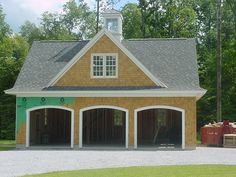 two car garage with three separate stalls on the front and one attached to the back