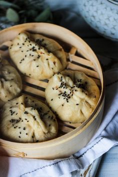 some food is in a wooden bowl on a table