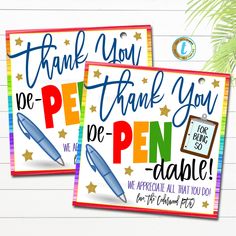 two thank you cards with pens and stars on the front, one is for someone to write