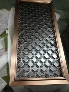 a metal grate sitting on top of a table