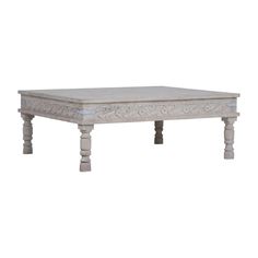 As you embrace hand-carved Indian furniture, you celebrate the old-world legacy of skilled craftsmen who have honed their techniques over generations. Our rustic Emin Rectangular Wood Coffee Table offers a symphony of textures, neutral shades, and distressed designs melding together to form a captivating view for your kitchen or apartment. Featuring a beautiful hand-carved façade, spacious tabletop, and metal accents, this large square coffee table tells a tale of self-expression and individuali Large Square Coffee Table, Carved Furniture, Indian Furniture, Unique Coffee Table, Decorative Table Lamps, Coffee Table White, Wood Coffee Table, Wooden Coffee Table, Rectangular Coffee Table