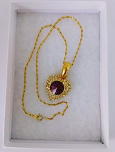 "Gorgeous piece of jewelry. NAPIER stamped unique chain. Gold-tone heart pendant stamped 290. Big diamond cut amethyst glass in the center with white crystals. Length; 16\" Ppendant:1.1/4\" x 1\" Perfect condition. Lovely gift. Thank you for visiting my store. You can also visit my MargaretJewelryShop or http://jewelryandclothing.net/" Gold Heart Pendant Necklace With Jewels, Vintage Gemstone Heart Pendant Necklace, Vintage Purple Heart-shaped Jewelry, Gold Heart-shaped Costume Jewelry Necklace, Gold Heart Shaped Costume Jewelry Necklace, Heart Pendant Necklace Gold, Blue Topaz Pendant Necklace, Big Light, Pendant Necklace Vintage