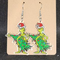 The Grinch With A Christmas Tree Dangle Earrings. The Charms Measure About 1.5" X 1.25". They Are Made Of Acrylic With Alloy Hooks Please Feel Free To Ask Any Questions That You May Have. Thanks For Looking! Dana Rebecca Designs, Earrings Acrylic, Gold Earrings For Women, Christmas Tree Earrings, Gold Pearl Earrings, Earring Tree, The Grinch, Colorful Earrings, Christmas Earrings