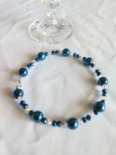 Blue Beaded Star-shaped Bracelets, Adjustable Blue Hand-strung Bracelets, Hand-strung Blue Crystal Bracelet As Gift, Adjustable Hand-strung Blue Pearl Bracelet, Casual Hand-strung Blue Crystal Bracelet, Blue Sparkles, Crystal Beads Bracelet, Glass Beaded Bracelets, Sparkling Crystal