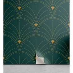 an art deco wallpaper design with gold and green accents on a dark green background