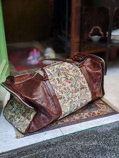 "Leather Fabric Duffle Bag Really Special and amazing Piece!! Amazing piece, really vintage and in good condition (only small sigs of use). Measures: W: 24.80\" (63 cm) Tall: 11.81\" (30 cm) Deep: 9.84\" (25 cm) Adjustable strap: 49.21\" (125 cm) Thanks for stopping by!!" Aesthetic Duffle Bags, Brown Shoulder Travel Bag, Vintage Duffle Shoulder Bag For Daily Use, Vintage Shoulder Duffle Bag For Daily Use, Vintage Duffle Bag With Leather Handles For Overnight Trips, Luxury Handmade Travel Bag, Vintage Weekender Bag With Leather Lining For Travel, Vintage Weekender Bag With Luggage Sleeve For Travel, Vintage Satchel Travel Bag For Everyday Use