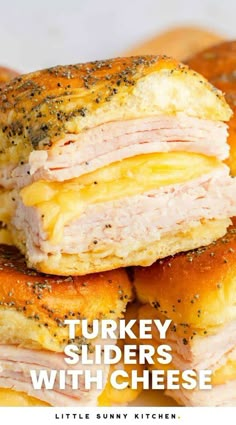 turkey sliders with cheese are stacked on top of each other and the title reads, turkey sliders with cheese