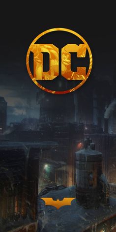 the dc logo on top of a city at night