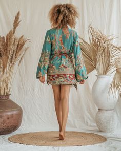 Our Short Kimono offers an easy, relaxed fit, combining comfort with understated elegance. Its fluid silhouette adds a touch of effortless charm to any outfit, making it a versatile piece for both casual days and special moments. Casual Long Sleeve Rayon Kimono, Chic Long Sleeve Kimono For Loungewear, Casual V-neck Kimono For Loungewear, Casual V-neck Rayon Kimono, Relaxed Fit V-neck Kimono For Loungewear, Fall Kimono With Relaxed Fit For Loungewear, Bohemian V-neck Sleepwear For Spring, Casual Relaxed Fit Kimono For Loungewear, Bohemian V-neck Spring Sleepwear