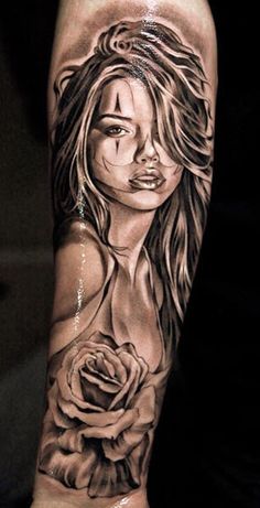 a woman with a rose tattoo on her arm