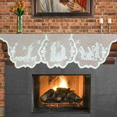 a fireplace with a painting on the mantle