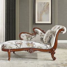 an ornately decorated chaise lounge chair in front of a painting on the wall